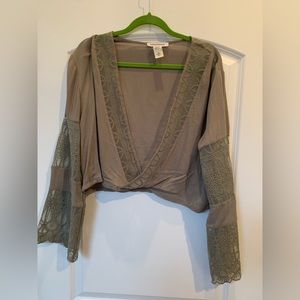Dark green size medium top purchased at a boutique